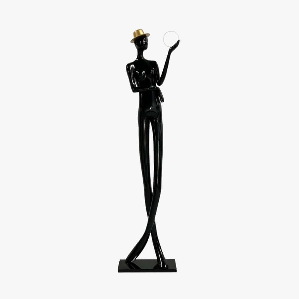 Lomexa sculptural floor lamp featuring a tall, elegant figure in a hat, a stylish art deco design perfect for living room lighting.