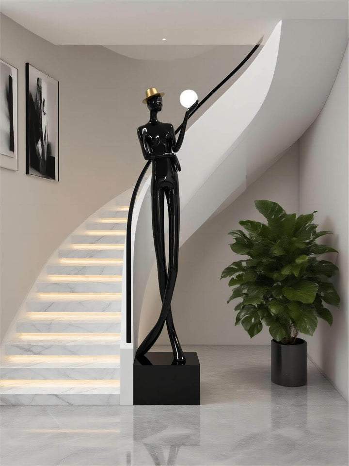 Sculptural floor lamp by Lomexa featuring a sleek black design, perfect for modern living room decor.