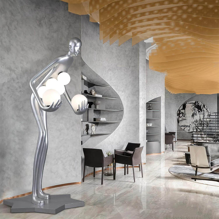 Sculptural floor lamp in contemporary living room, featuring sleek design and multiple lights for modern decor.
