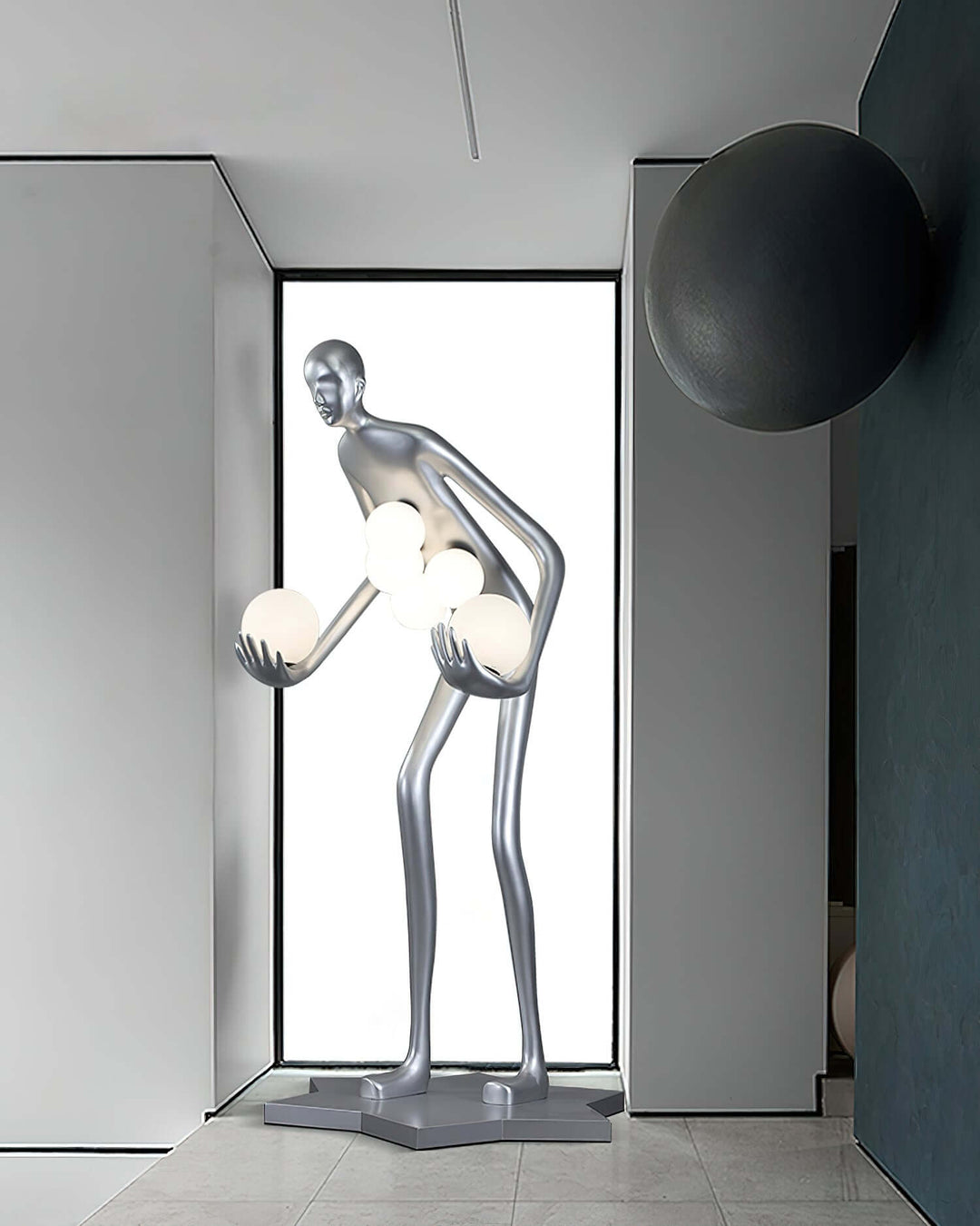 Sculptural floor lamp in a unique mannequin design, illuminating modern living space with artistic flair.