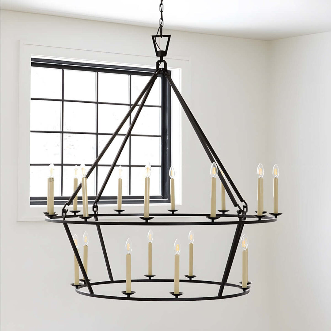 Modern mid-century 12-light chandelier in black, featuring candle-style bulbs, ideal for dining room decor.