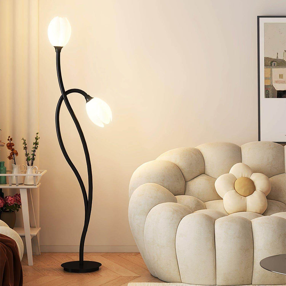 Manta Flower Floor Lamp, a minimalist modern black metal floor lamp with white shades, enhancing contemporary interiors.