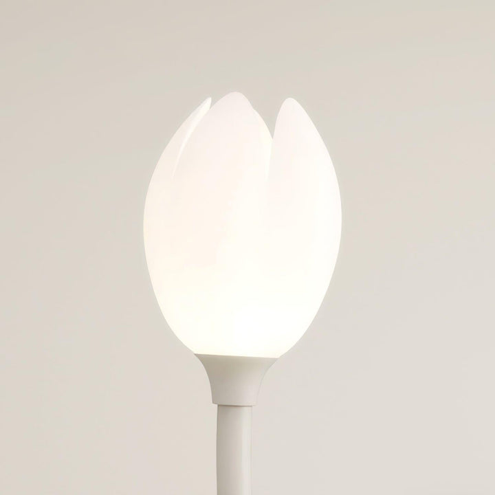 Manta Flower Floor Lamp, a modern white metal floor lamp with a minimalist design, perfect for stylish lighting.