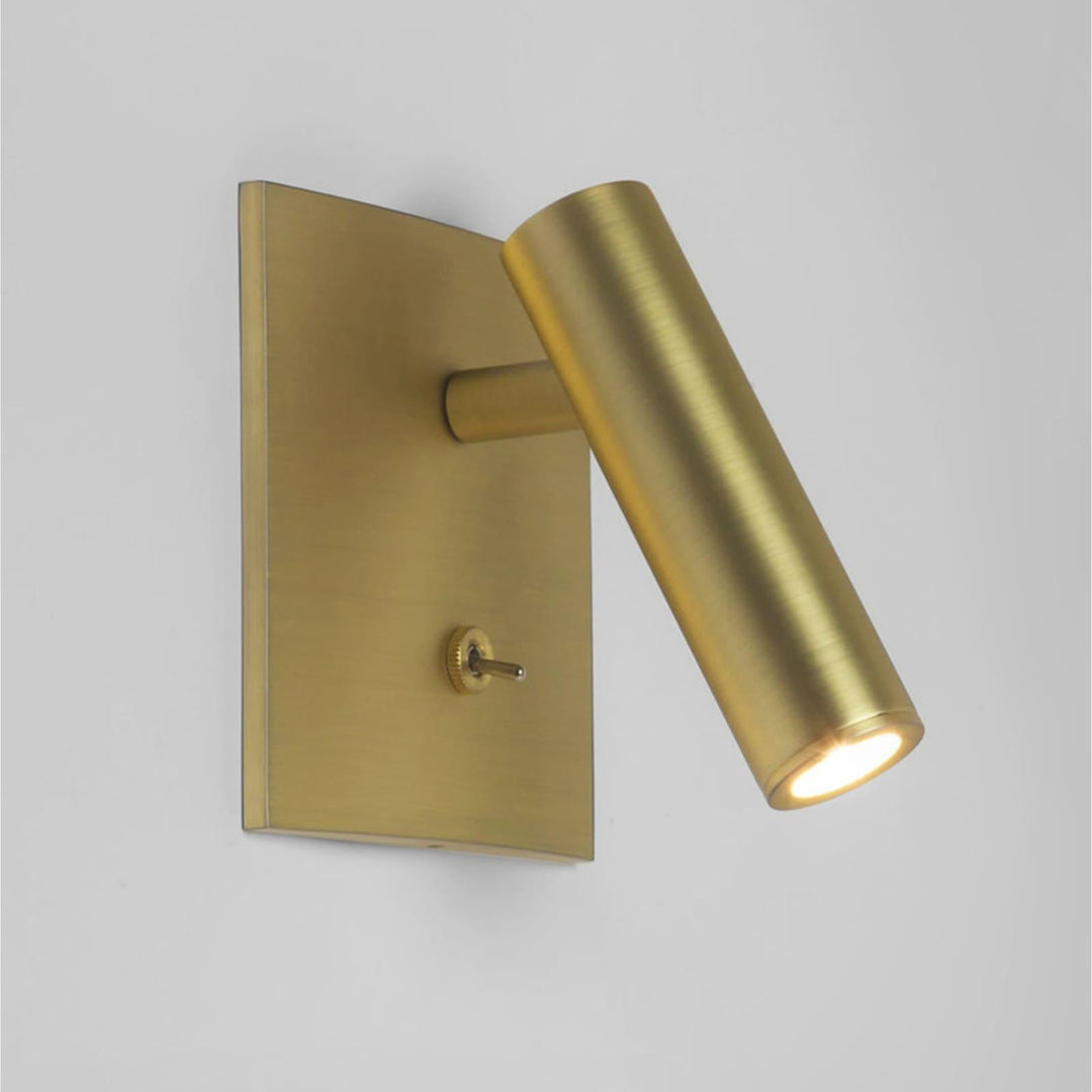 Minimalist Micro Square Switched Sconce in brushed brass, perfect as a flush mount wall sconce or wall mount reading lamp.