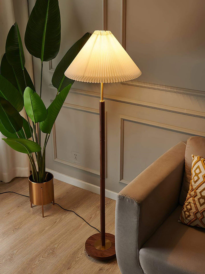 Mid Century pleated floor lamp in a stylish living room, perfect as a wooden floor light and trendy floor lamp.