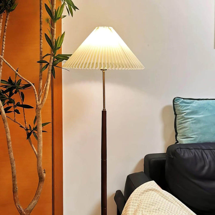 Mid Century pleated floor lamp in stylish living room, ideal wooden floor light for trendy décor and ambiance.