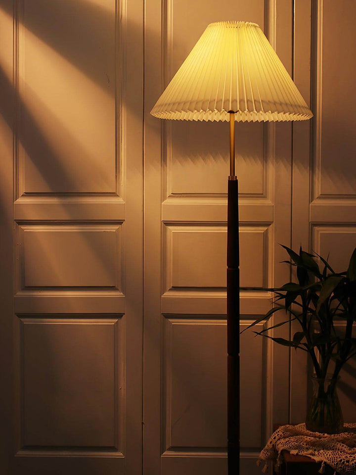 Mid Century pleated wooden floor lamp featuring a stylish shade, perfect for trendy living room decor.