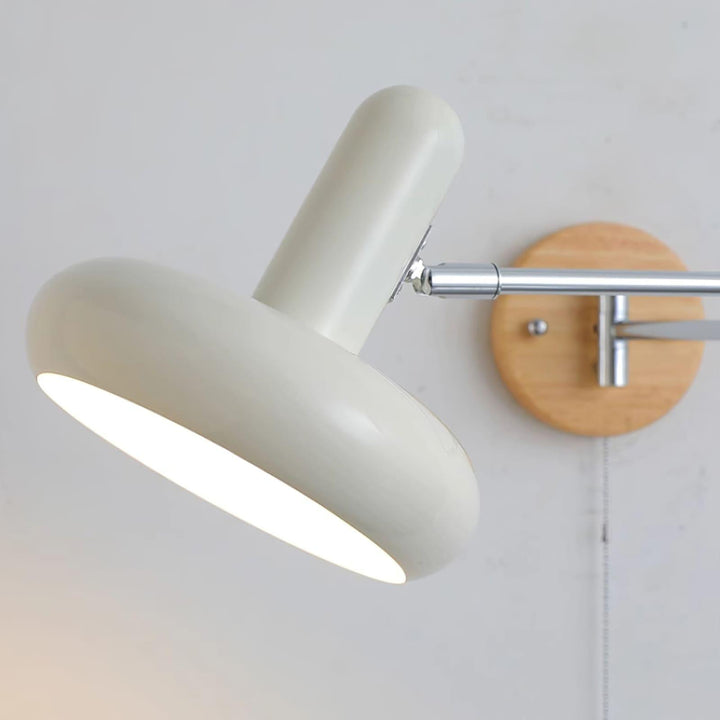 Mitzi Maddie wall lamp featuring a modern white design, articulating arm, and ideal for wall mounted reading lights.