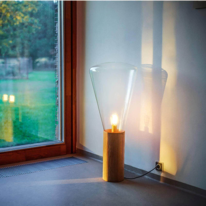 Muffins Floor Lamp featuring a wooden base and glass shade, perfect for industrial style office decor.