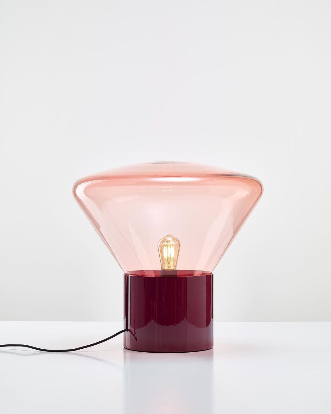 Muffins Table Lamp featuring round pink glass shade and burgundy base, perfect art deco lamp for living room lighting.