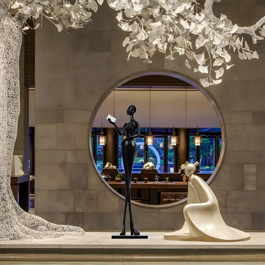 Muse Noir Resin Sculpture - Elegant Art Deco decorative ornament, ideal for living room décor.