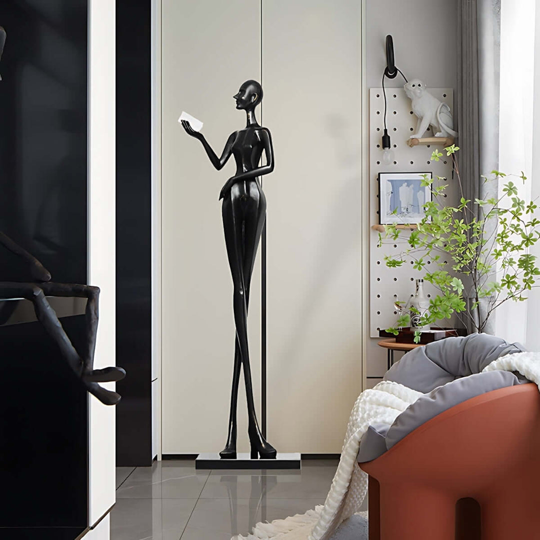 Muse Noir Sculpture in living room, a striking Art Deco resin sculpture decorative ornament, enhancing modern decor.