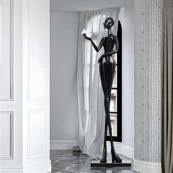 Resin Muse Noir sculpture for living room decor, showcasing elegant Art Deco style and modern decorative ornamentation.