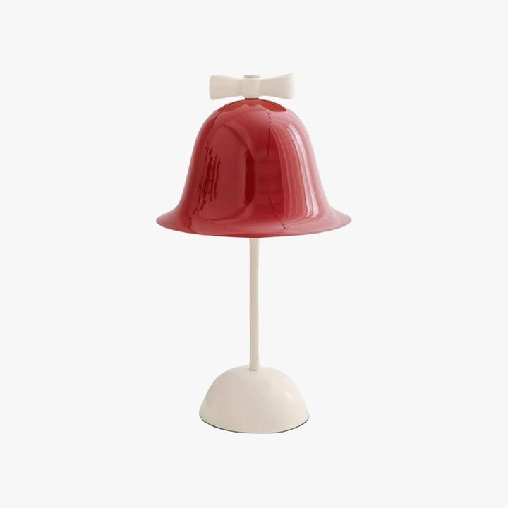 Cute red lamp with bell shape and bow, perfect for bedside or dining room decor.