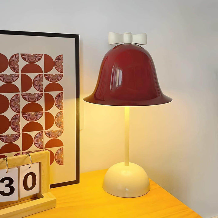 Nessino Table Lamp in red with a bow on top, perfect as a cute bedside or dining room table lamp.