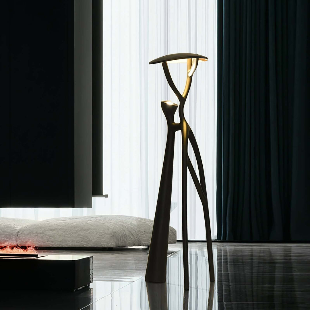Sculptural Nivaro resin floor lamp in sleek design, perfect for art deco style living rooms and modern interiors.