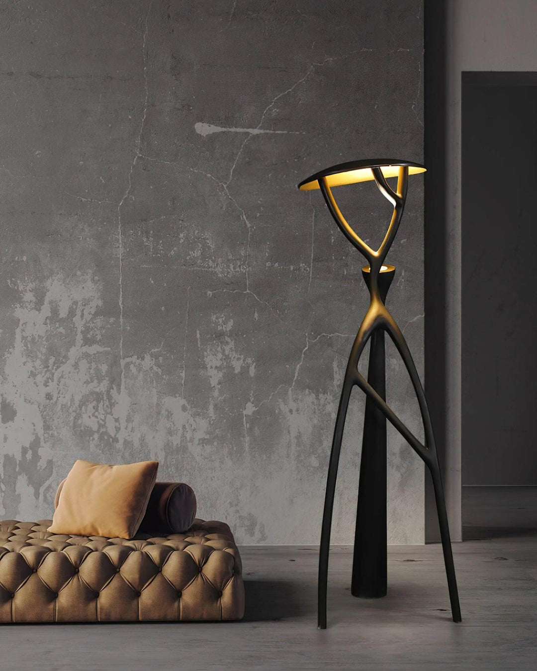 Sculptural Art Deco floor lamp in stylish living room with tufted sofa, perfect for modern decor.