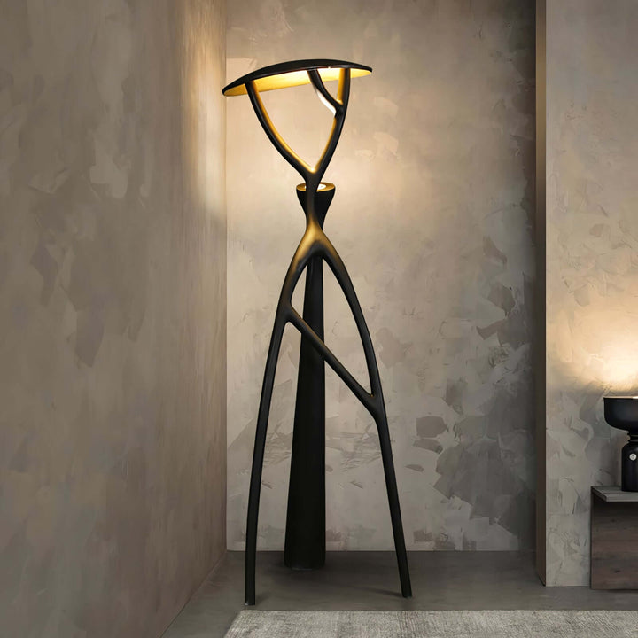 Sculptural resin floor lamp in an art deco style, ideal for living room decor and enhancing ambiance.