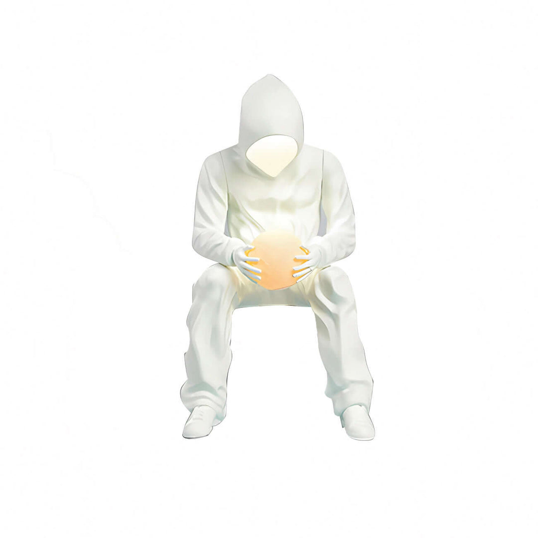 Unique art deco floor lamp featuring a sculptural figure holding a glowing orb, perfect for modern living room decor.