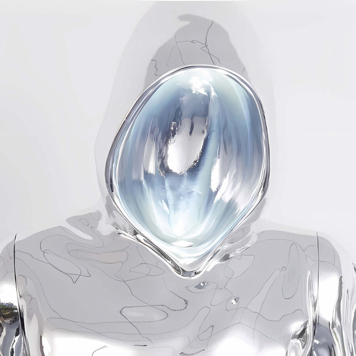 Close-up of a futuristic sculptural figure with a reflective surface and a glass-like hood, suggesting an artistic design.
