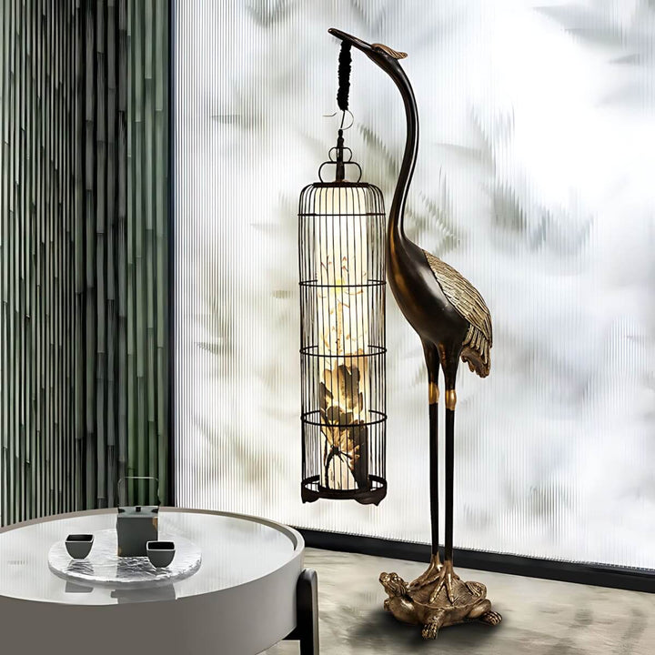Sculptural Noyari Stork floor lamp with lantern design, perfect for living room decor in art deco style.