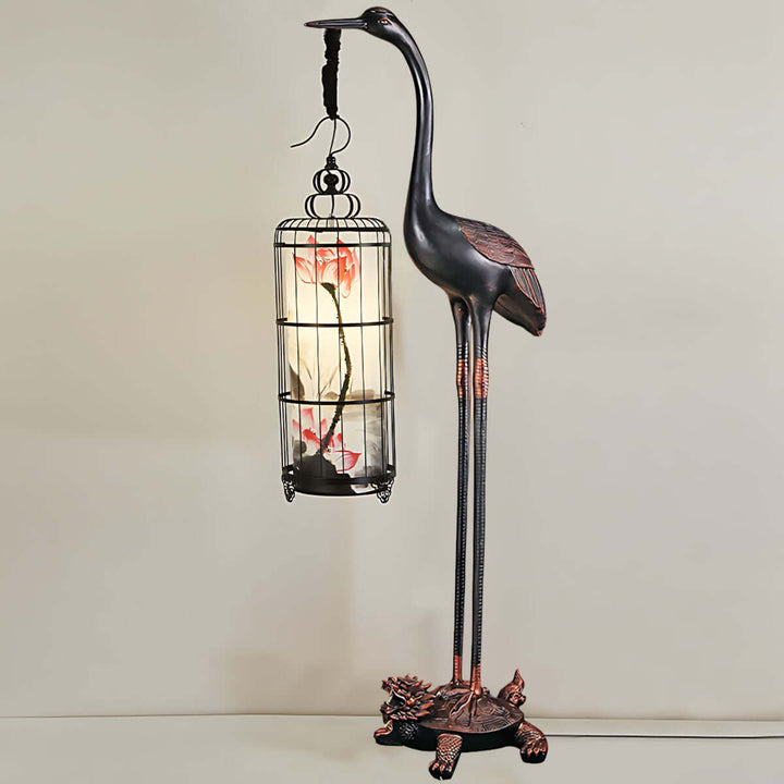 Noyari Stork Floor Lamp, a sculptural art deco design featuring a lantern style light, perfect for retro living room decor.