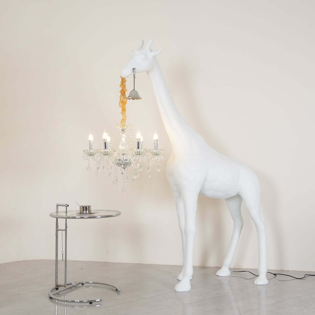 Nuvexa sculptural giraffe floor lamp with an art deco chandelier, perfect for stylish living room lighting.