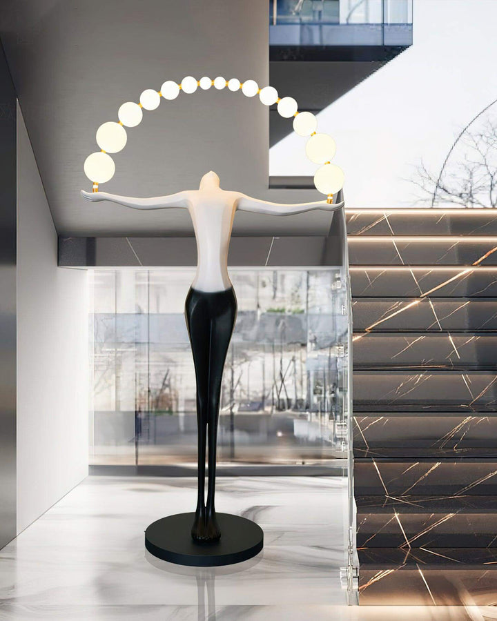 Olyvra Sculptural Floor Lamp in modern home setting, perfect for art deco-inspired living room decor.