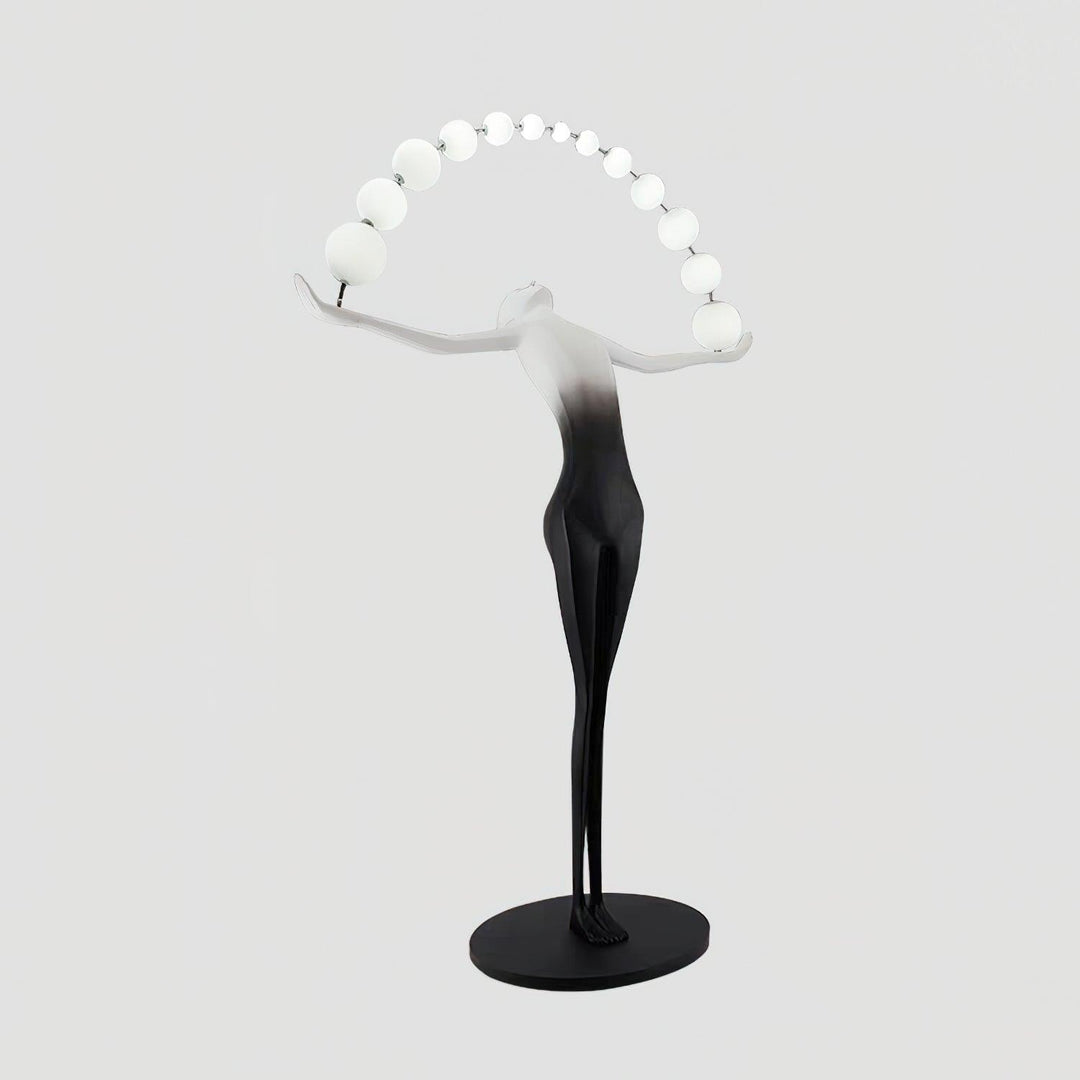 Olyvra sculptural floor lamp in art deco style with white spheres and black base, ideal for modern living room lighting.