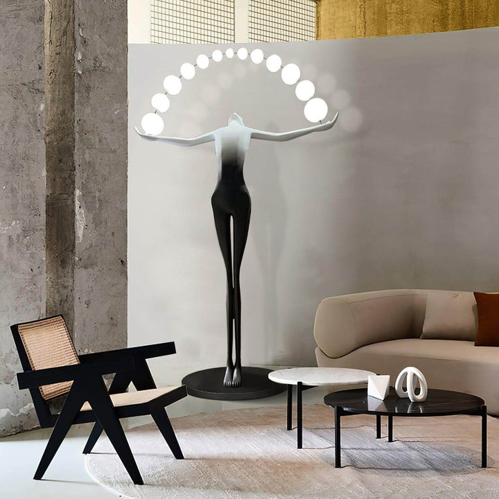 Olyvra sculptural floor lamp in a modern living room, art deco design, stylish floor lights for living room decor.