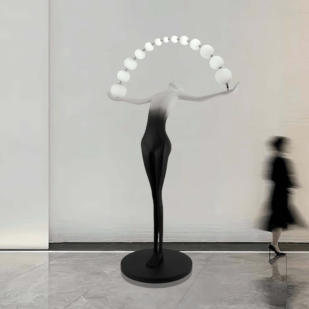 Olyvra sculptural floor lamp in modern setting, elegant art deco design, perfect floor lights for living room.