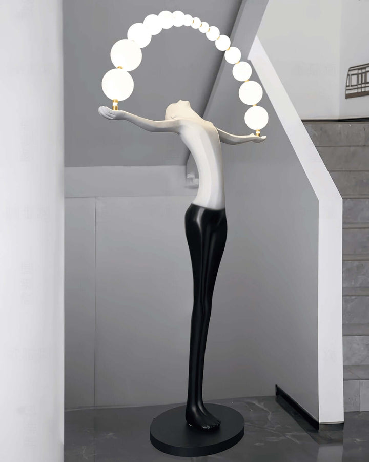 Olyvra sculptural floor lamp with art deco design, bright orbs, perfect for modern living room decor.