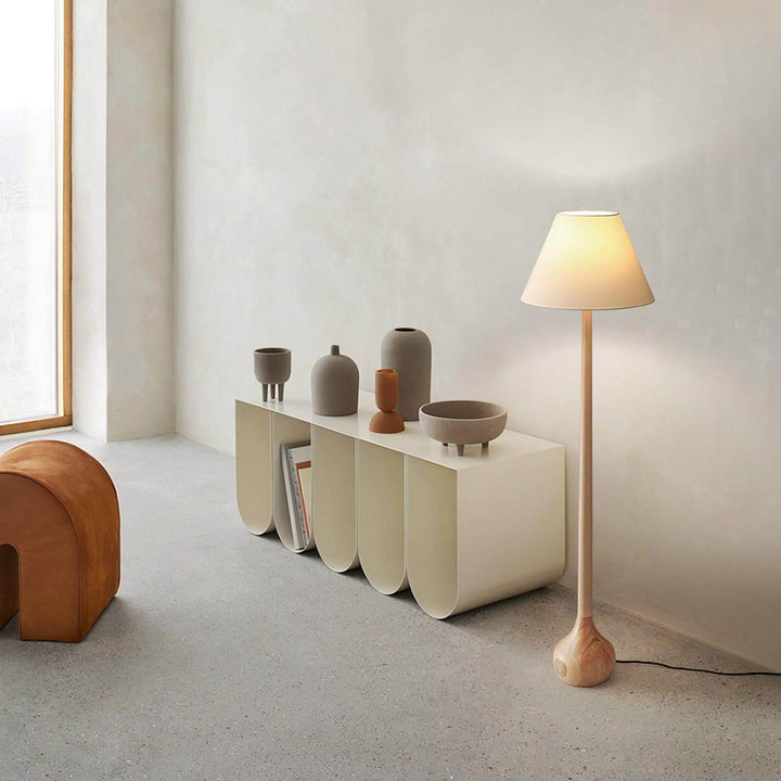 Osaka wooden floor lamp in a modern living room setting, complementing rustic decor and stylish floor lights.