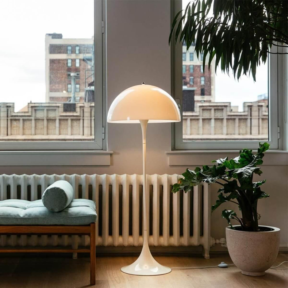 Panthella floor lamp in modern living room, a white acrylic floor lamp adds elegance to the space.