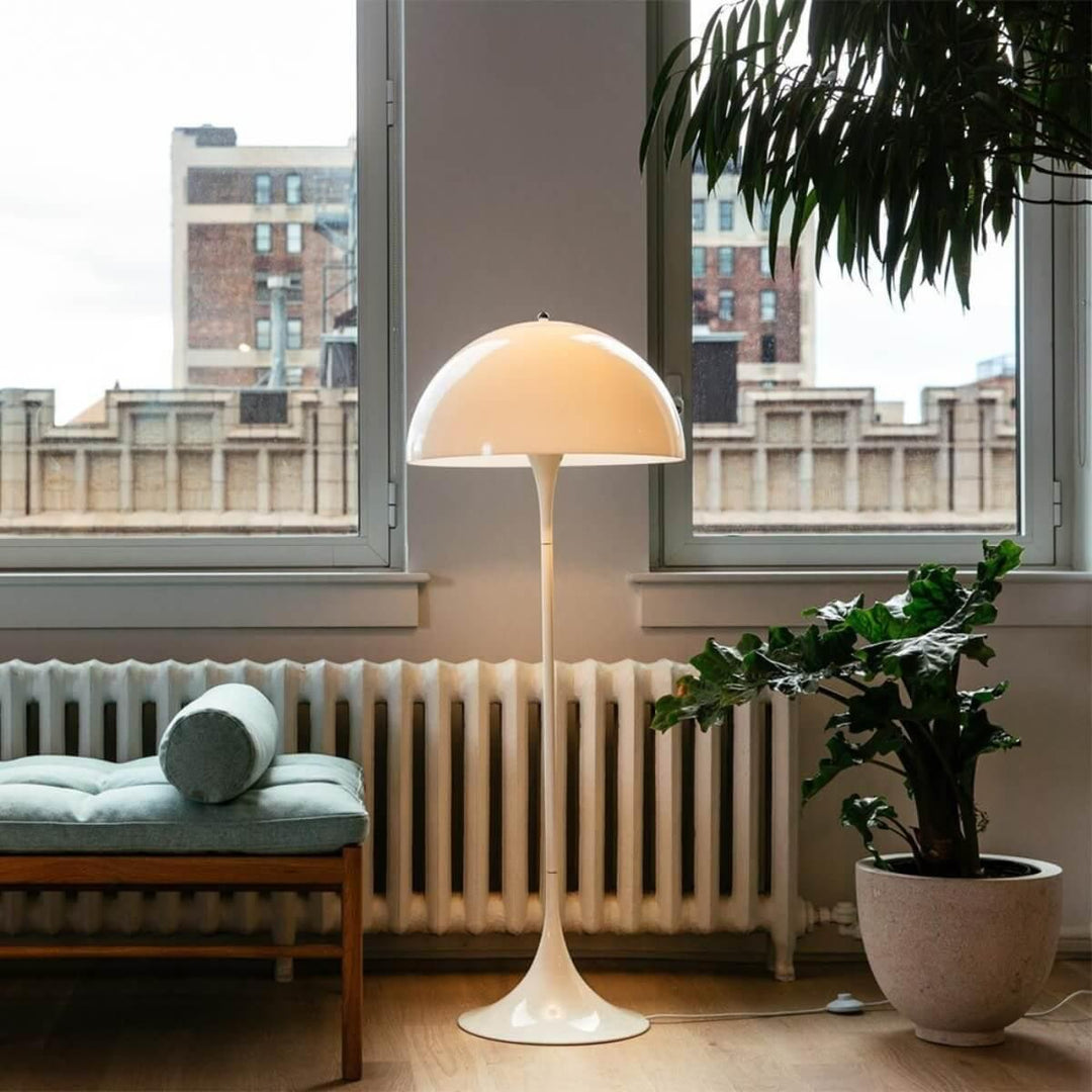 Panthella floor lamp in modern living room, a white acrylic floor lamp adds elegance to the space.