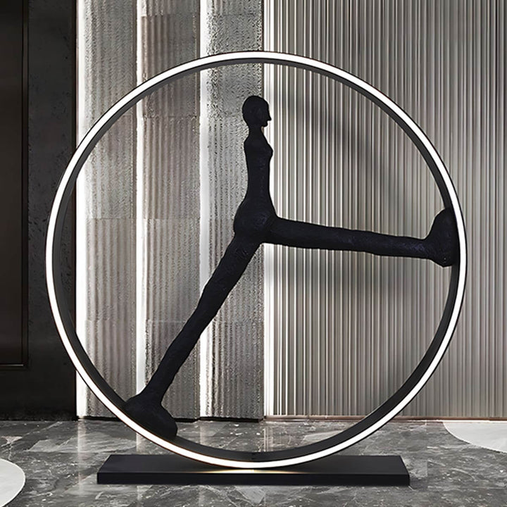 Sculptural art deco floor lamp with a unique figure design, perfect for stylish living room lighting.