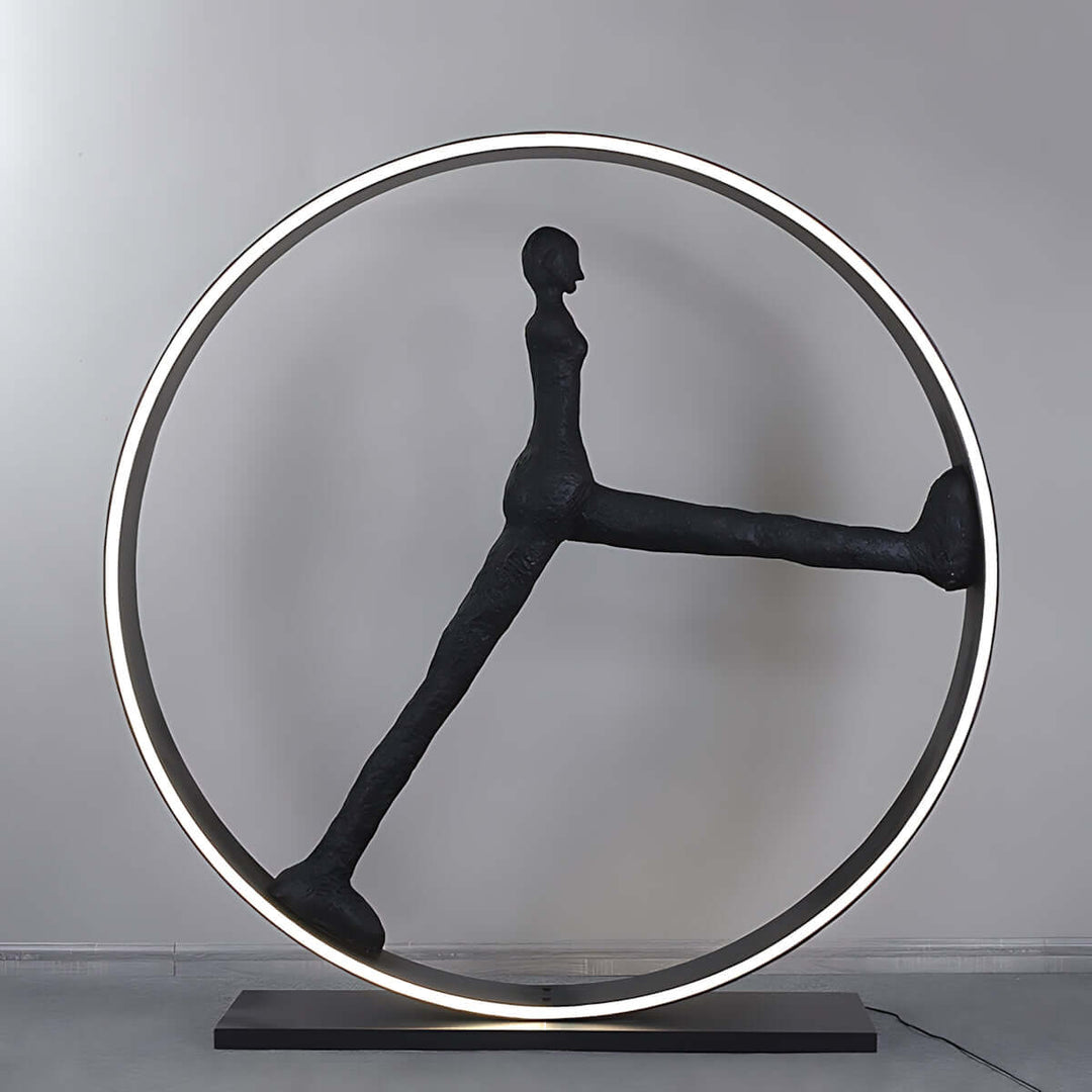Quastra sculptural floor lamp in art deco style, featuring a unique design with circular base for living room lighting.