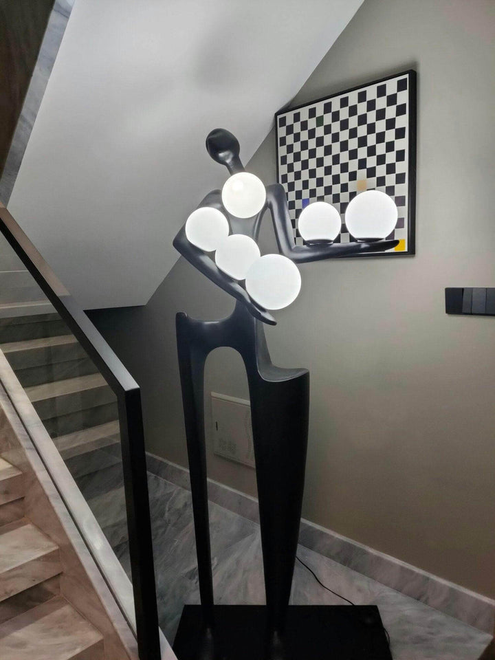 Sculptural floor lamp in modern design with circular light fixtures, perfect for living room decor and art deco style.