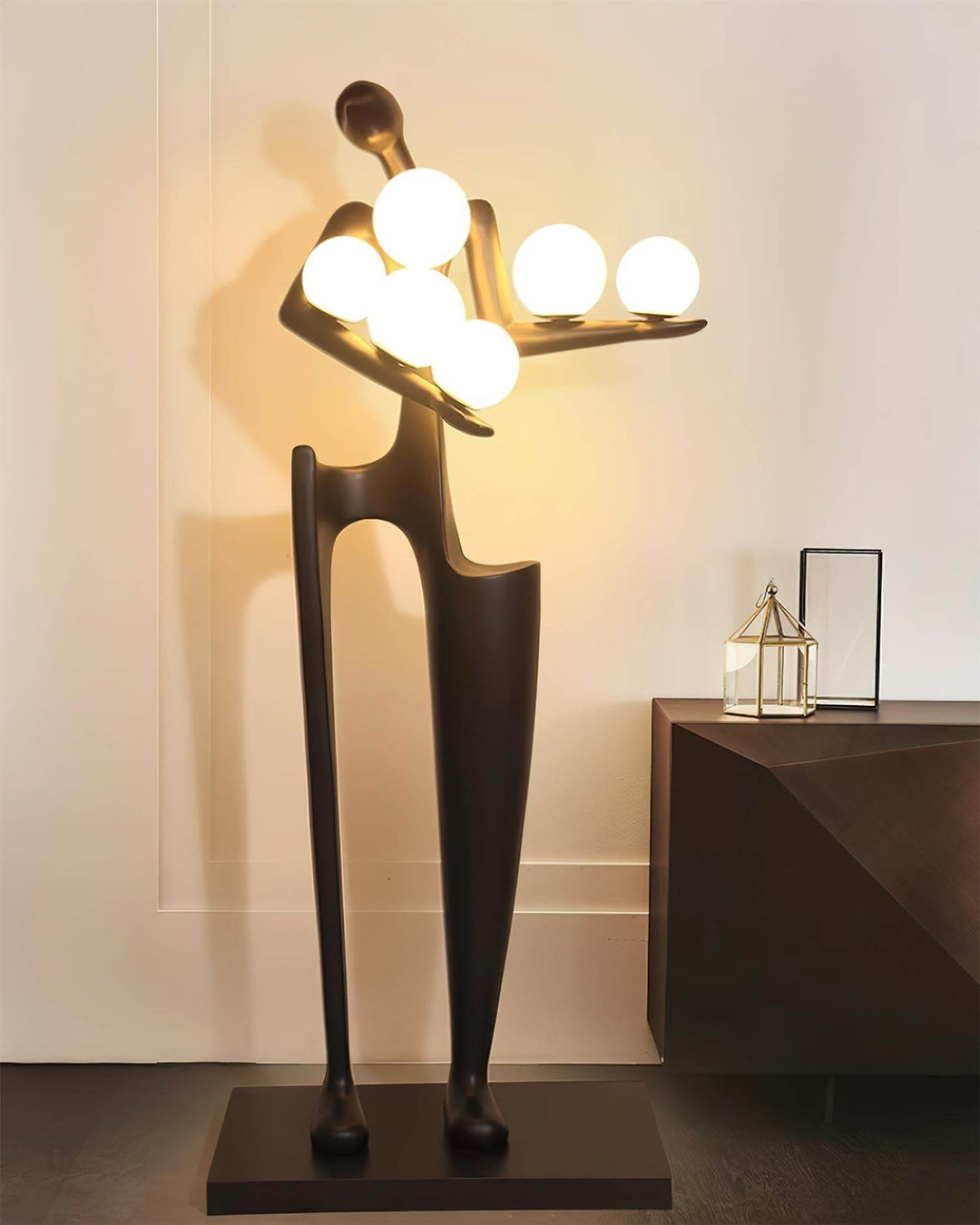 Sculptural floor lamp with a unique design featuring glowing spheres, perfect as an art deco floor lamp for living rooms.