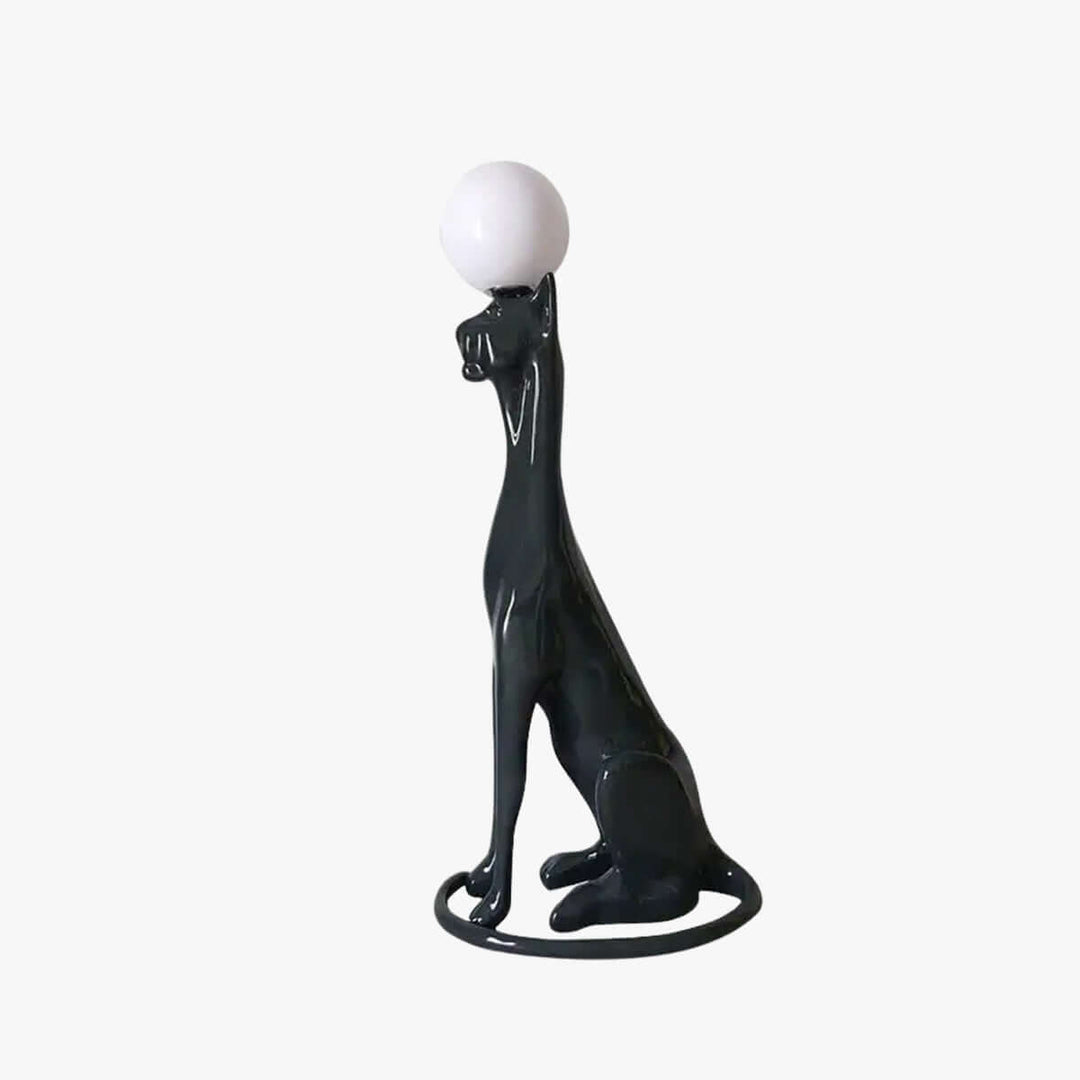Sculptural black cat floor lamp with spherical light ideal for contemporary living room decor.