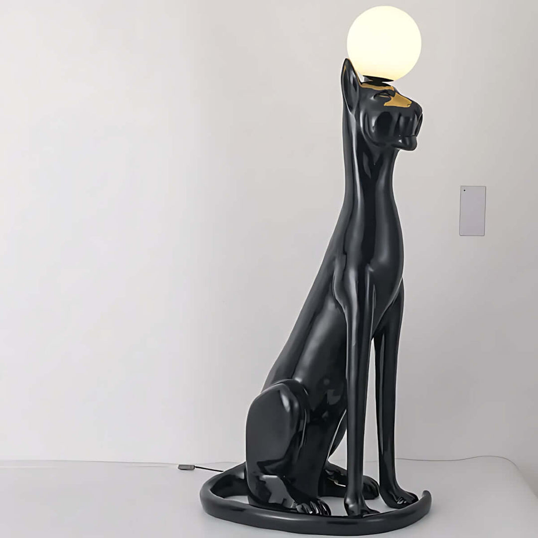 Stylish black dog sculpture floor lamp with a round white bulb, perfect for modern home decor.