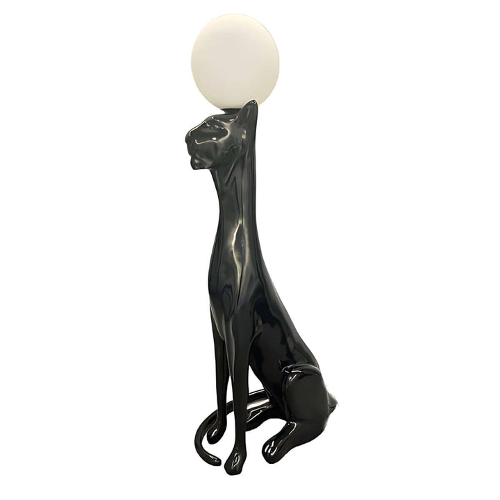 Sculptural black cat floor lamp with round white shade, a striking decor piece for modern living spaces.