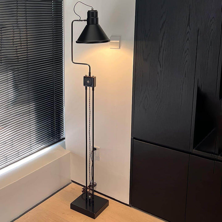 Retro Toia black industrial floor lamp, 160cm tall, perfect for corner lighting in modern interiors.
