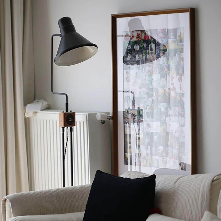 Retro Toia Floor Lamp in a cozy living room, featuring a black industrial style, perfect as a corner floor lamp.