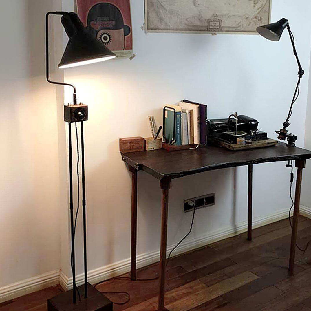 Retro Toia industrial floor lamp in a cozy corner, perfect for enhancing study or living spaces with style.