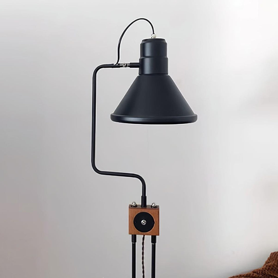 Retro Toia Floor Lamp featuring a black industrial design, perfect as a corner or accent lighting solution.