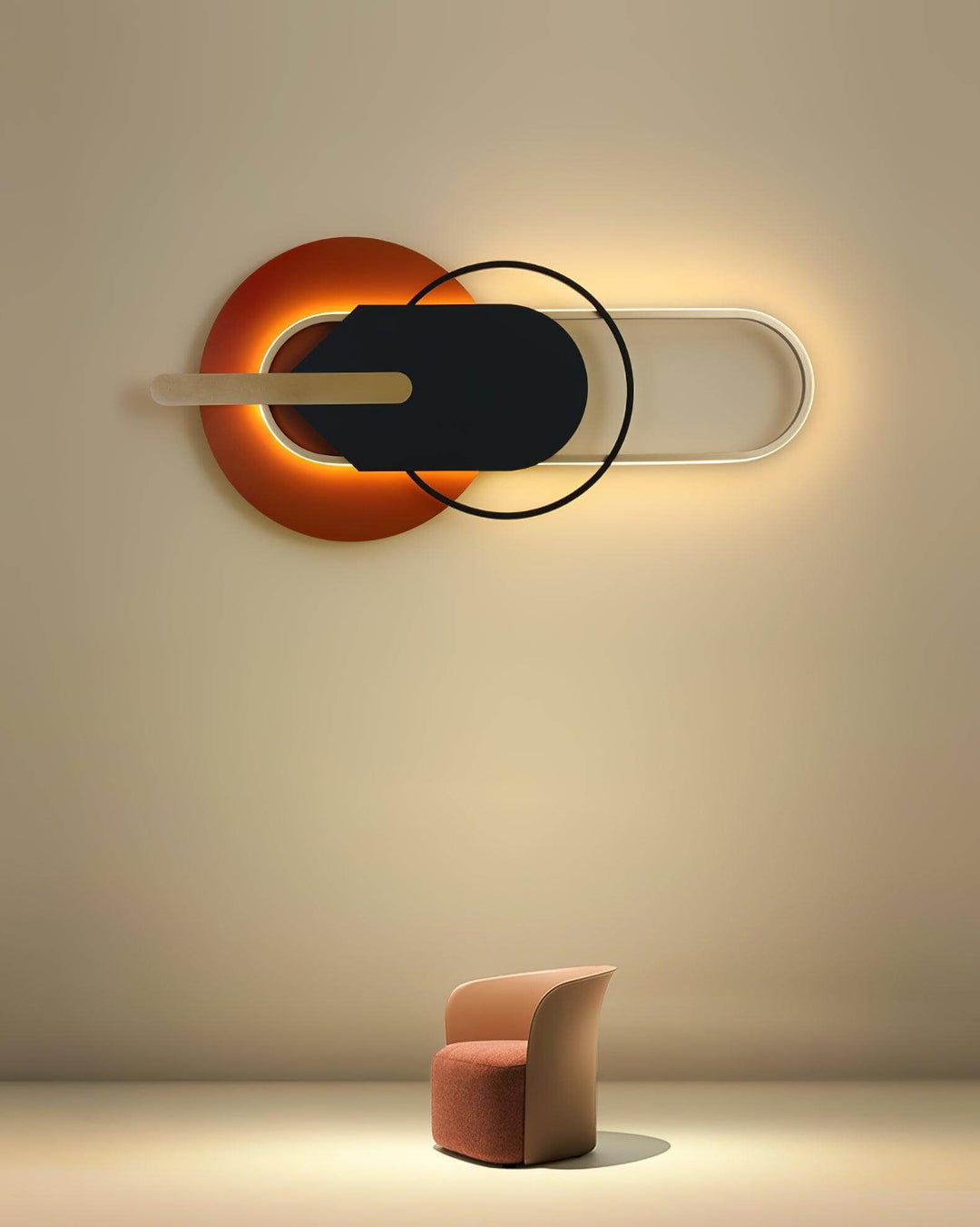 Contemporary round and oval wall light above a stylish chair, ideal for large living room sconces.