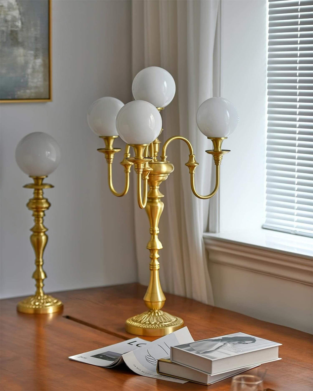 Elegant Solora brass table light with five globes, perfect for mid-century modern living room decor.