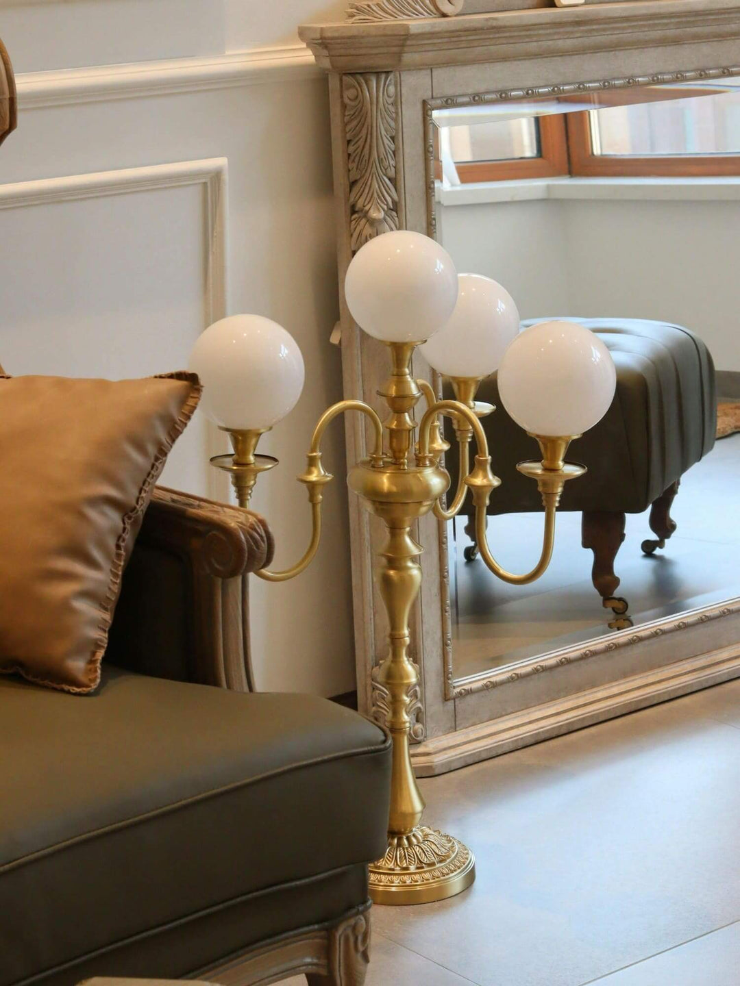 Elegant brass table light with four globes, perfect for mid century modern decor in living room settings.