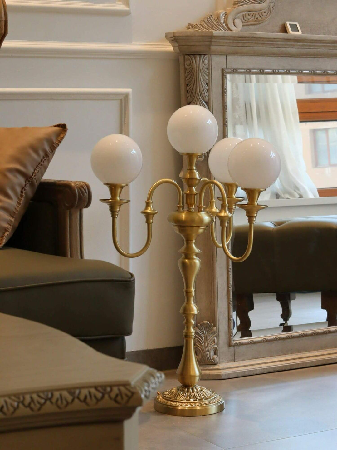 Solora brass table light with three globes, perfect mid century modern table lamp for living room decor.